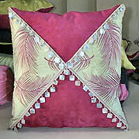Square cushion cover with contrast fabric and shell trim.